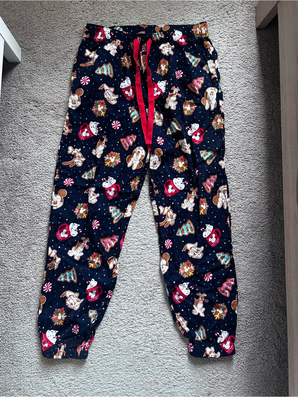 Disney x sold Navy Holiday Print Navy Pajama Joggers with Red Drawstring